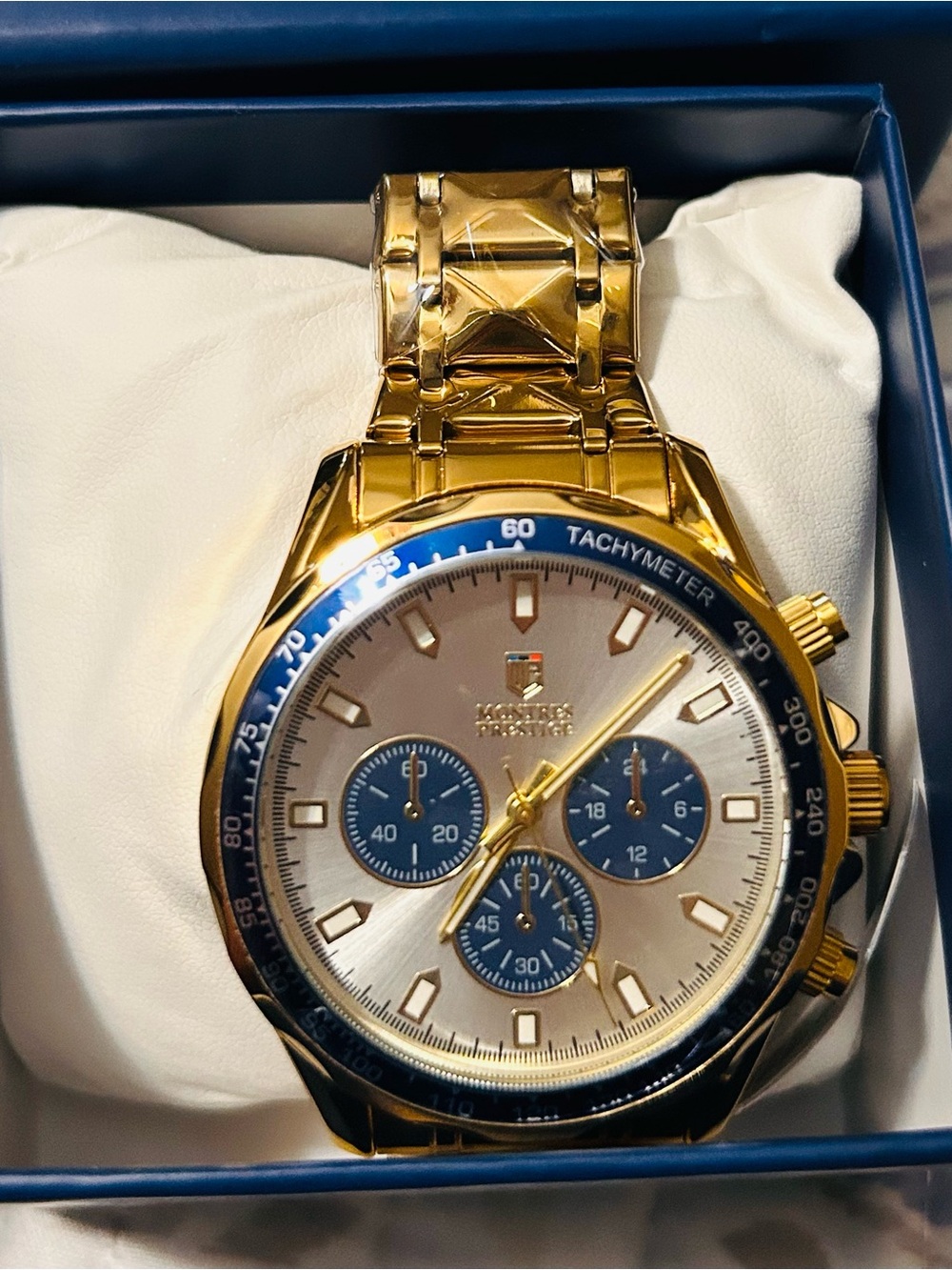 Gold Men's Chronograph Watch with Blue Accents